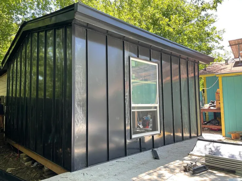 Black standing seam metal wall panels for Metal Roof Installation in Chapel Hill